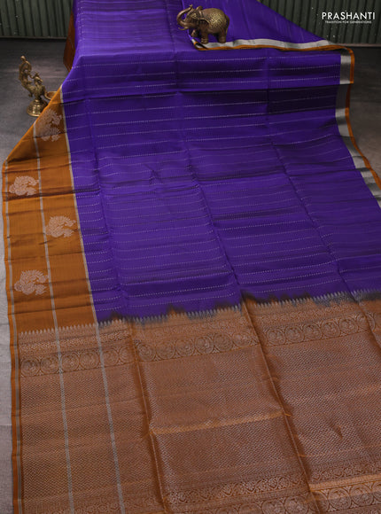 Kanchipuram soft silk saree blue and mustard yellow with allover silver zari weaves and long zari woven butta border