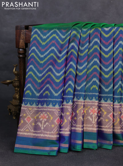 Rajkot patola silk saree purple and dual shade of bluish green with allover ikat butta weaves and ikat woven zari border