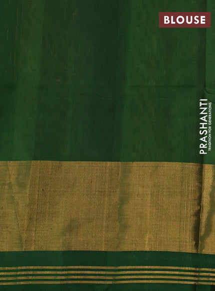 Rajkot patola silk saree mustard yellow and green with allover ikat weaves and ikat woven zari border