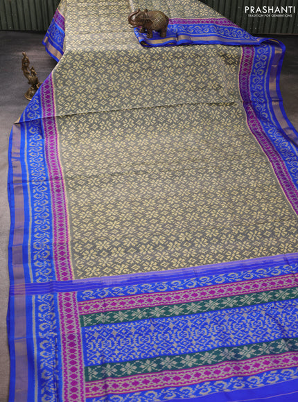 Rajkot patola silk saree grey and royal blue with allover ikat weaves and ikat woven zari border