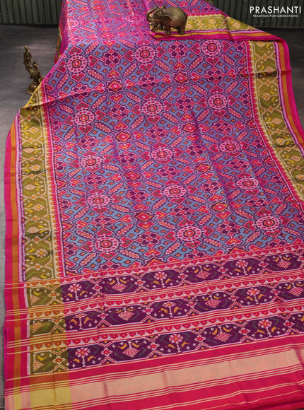 Rajkot patola silk saree teal blue and purple with allover ikat weaves and ikat woven zari border