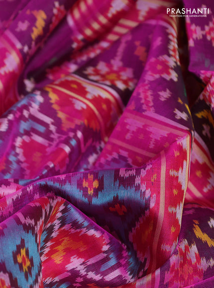 Rajkot patola silk saree teal blue and purple with allover ikat weaves and ikat woven zari border