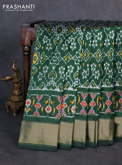 Pochampally silk saree bottle green with allover ikat weaves and zari woven border