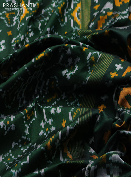 Pochampally silk saree bottle green with allover ikat weaves and zari woven border