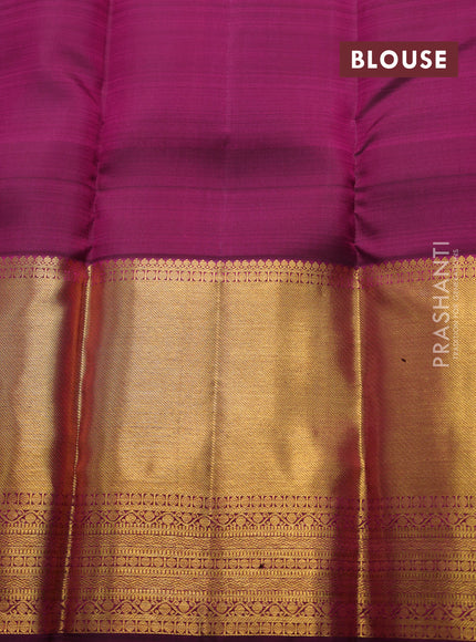 Pure kanchipuram silk saree dual shade of pinkish orange and magenta pink with zari woven buttas and long zari woven border