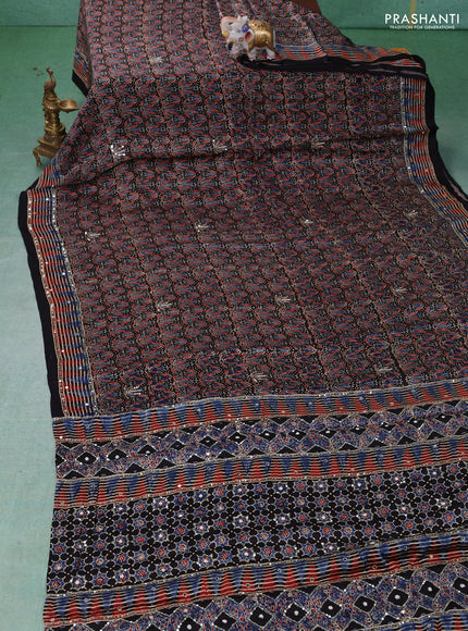 Modal silk saree black with allover ajrakh prints & sequin work and mirror sequin work pallu