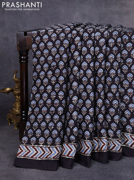 Modal silk saree black with allover ajrakh prints & sequin work and mirror sequin work pallu