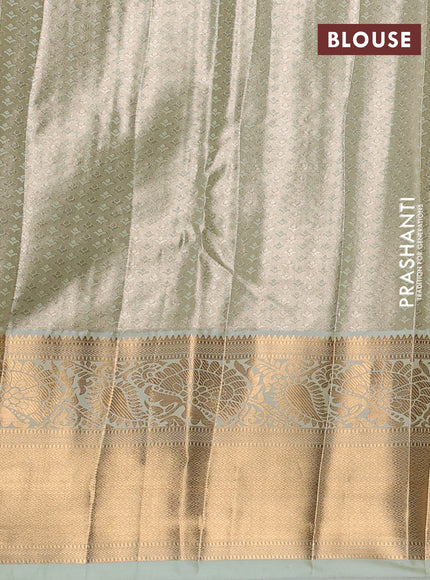 Bangalori tissue silk saree teal green with allover zari woven brocade weaves and long zari woven border