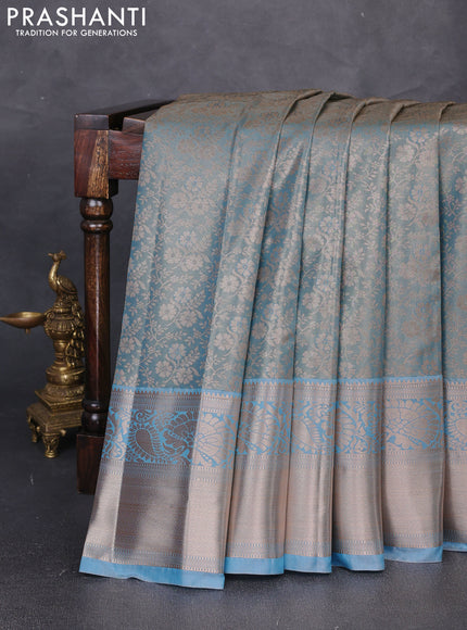 Bangalori tissue silk saree teal blue with allover zari woven brocade weaves and long zari woven border