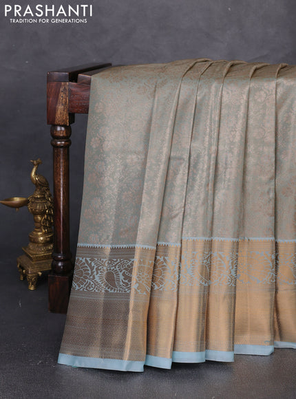 Bangalori tissue silk saree teal blue with allover zari woven brocade weaves and long zari woven border