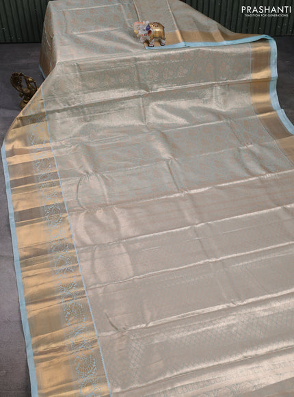 Bangalori tissue silk saree teal blue with allover zari woven brocade weaves and long zari woven border