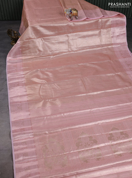 Bangalori tissue silk saree peach shade and baby pink with allover zari woven brocade weaves and zari woven border