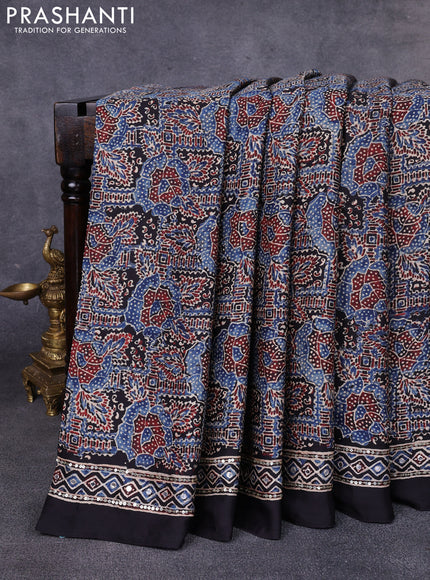Modal silk saree black with allover ajrakh prints & sequin work and mirror sequin work pallu