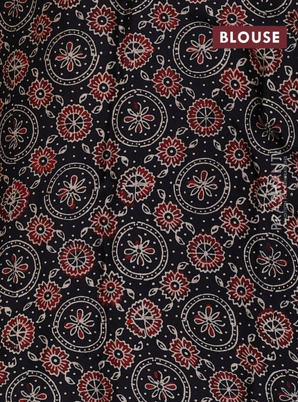 Modal silk saree black with allover ajrakh prints & sequin work and mirror sequin work pallu