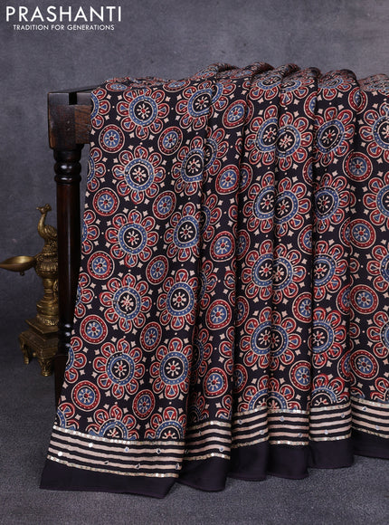Modal silk saree black with allover ajrakh prints & sequin work and mirror sequin work pallu