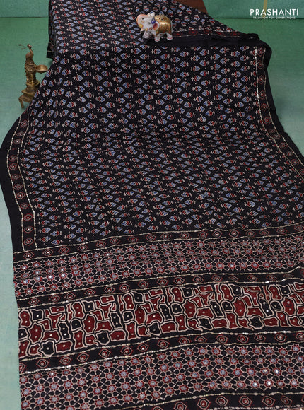 Modal silk saree black with allover ajrakh prints & sequin work and mirror sequin work pallu