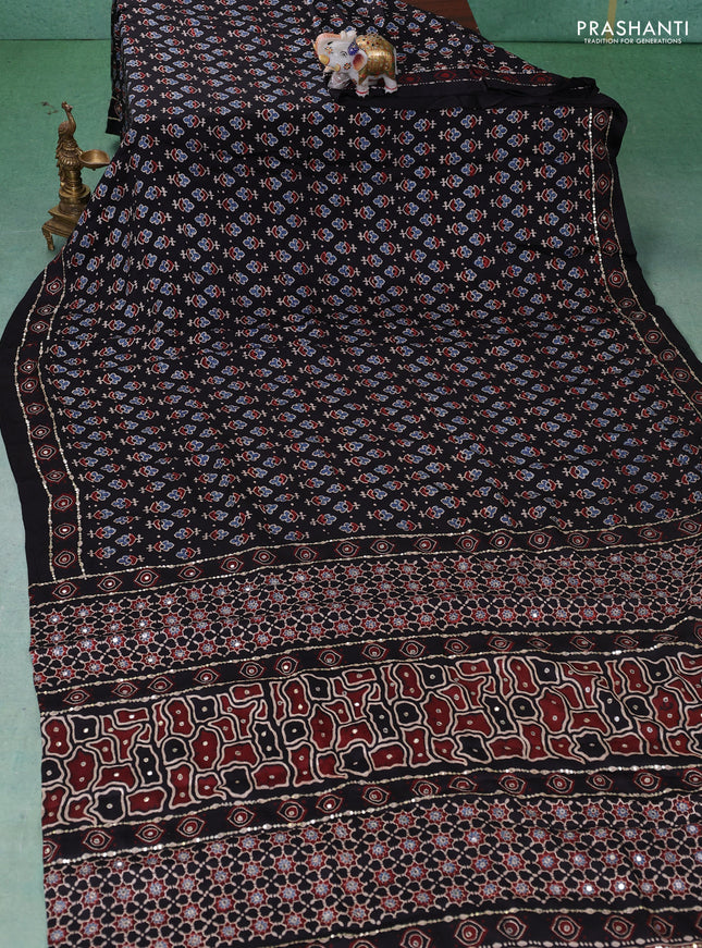 Modal silk saree black with allover ajrakh prints & sequin work and mirror sequin work pallu