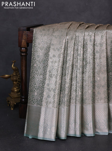 Bangalori tissue silk saree pastel green with allover zari woven brocade weaves and long zari woven border