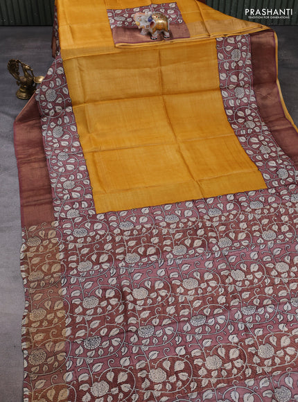 Pure tussar silk saree mustard yellow and pastel brown with plain body and long printed zari woven border