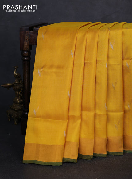 Pure uppada silk saree yellow and bottle green with silver & gold zari woven buttas and zari woven border