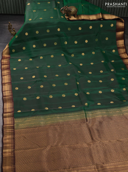 Kanchipuram silk saree green and coffee brown with rudraksha zari woven buttas and temple design zari woven border
