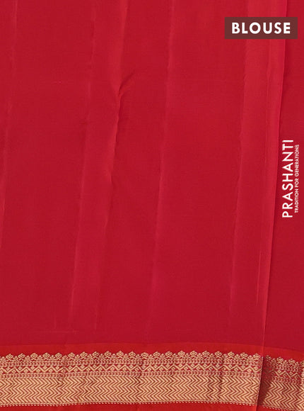 Kanchipuram silk saree light green and orange with allover zari woven buttas and zari woven border