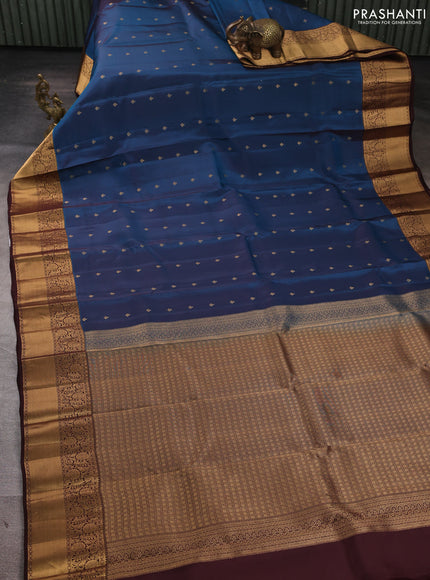 Kanchipuram silk saree peacock blue and coffee brown with allover zari woven buttas and rich zari woven border