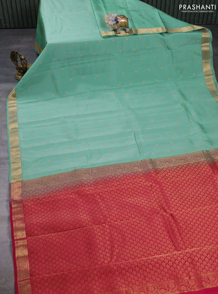 Kanchipuram silk saree teal shade and dark pink with allover zari woven buttas and zari woven border