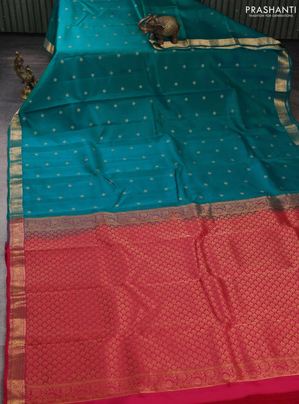 Kanchipuram silk saree teal green and pink with allover zari woven buttas and zari woven border