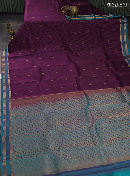 Kanchipuram silk saree deep purple and peacock green with allover zari woven stripes & buttas and rettapet zari woven border