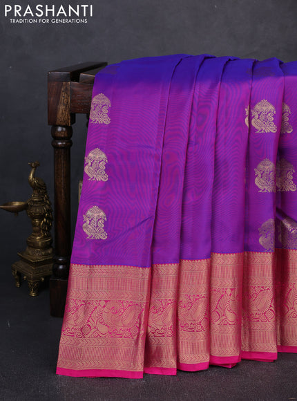 Kanchipuram silk saree purple and pink with peacock zari woven buttas and long zari woven border