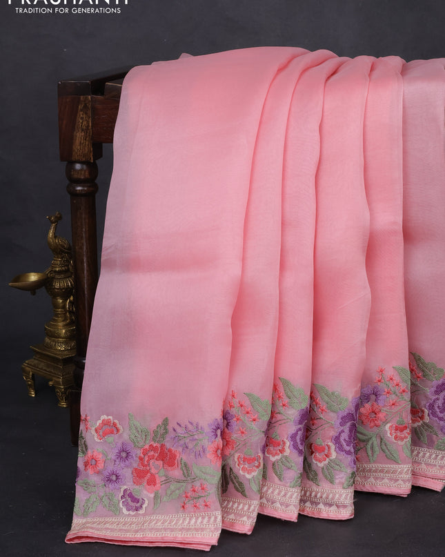 Pure organza silk saree light pink with plain body and floral design embroidery work border