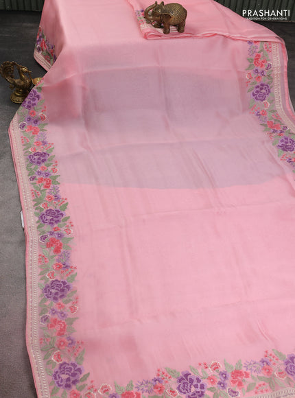 Pure organza silk saree light pink with plain body and floral design embroidery work border