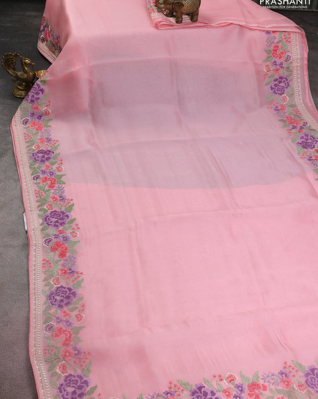 Pure organza silk saree light pink with plain body and floral design embroidery work border