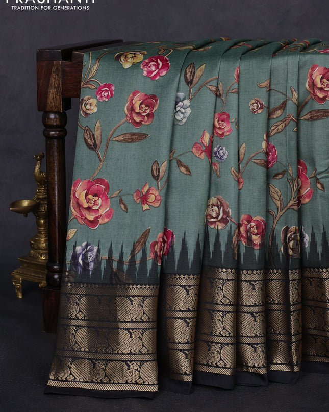 Pochampally silk saree pastel green and black with allover floral digital prints and temple design annam zari woven border