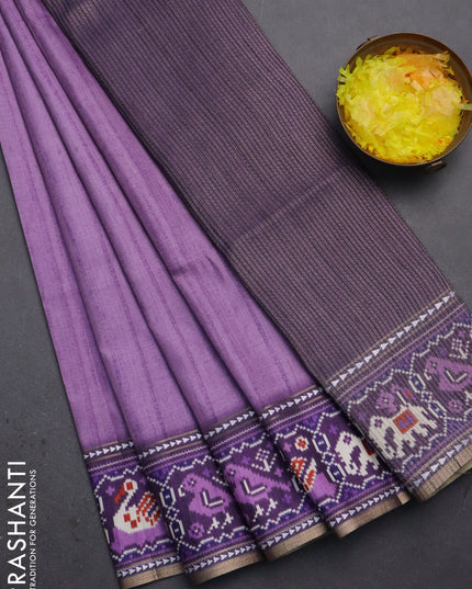 Semi tussar saree mild purple and purple with plain body and patola printed border