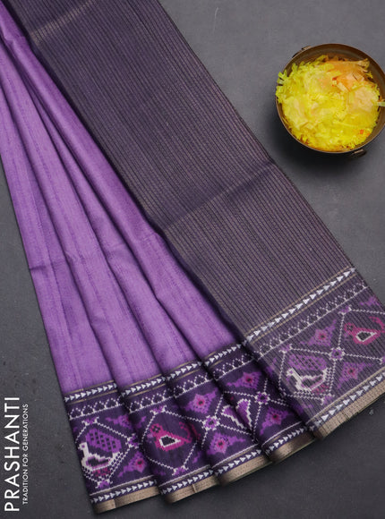 Semi tussar saree mild purple and purple with plain body and patola printed border