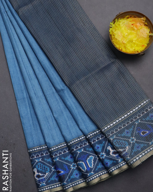 Semi tussar saree blue shade and peacock blue with plain body and patola printed border
