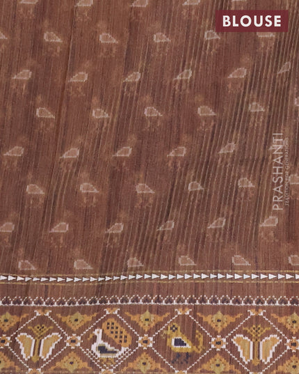 Semi tussar saree sandal and brown with plain body and patola printed border