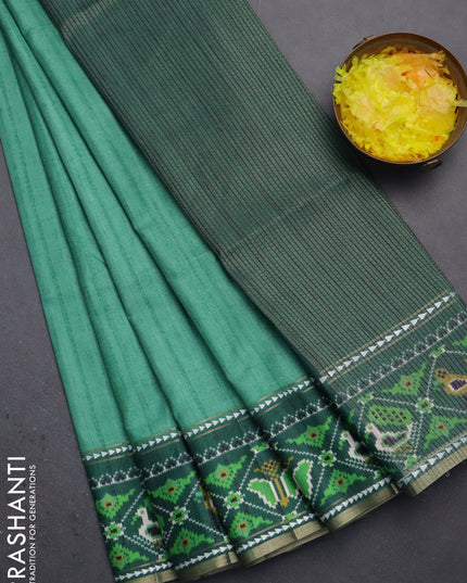 Semi tussar saree teal green and green with plain body and patola printed border