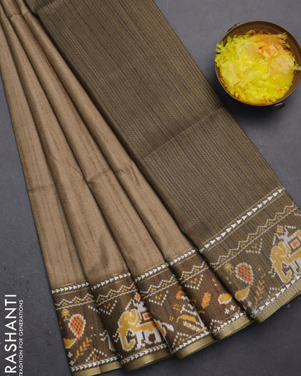 Semi tussar saree elaichi green and sap green with plain body and patola printed border