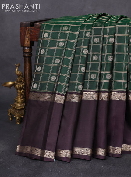 Pure kanchipuram silk saree bottle green and wine shade with allover zari checks & buttas and long rettapet zari woven border