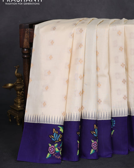 Pure gadwal silk saree cream and blue with zari woven buttas and temple design embroidery border