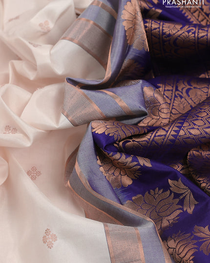 Pure gadwal silk saree cream and blue with zari woven buttas and temple design embroidery border