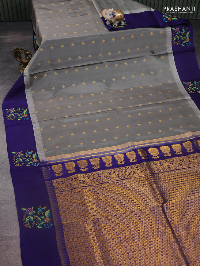 Pure gadwal silk saree grey and blue with zari woven buttas and temple design embroidery border