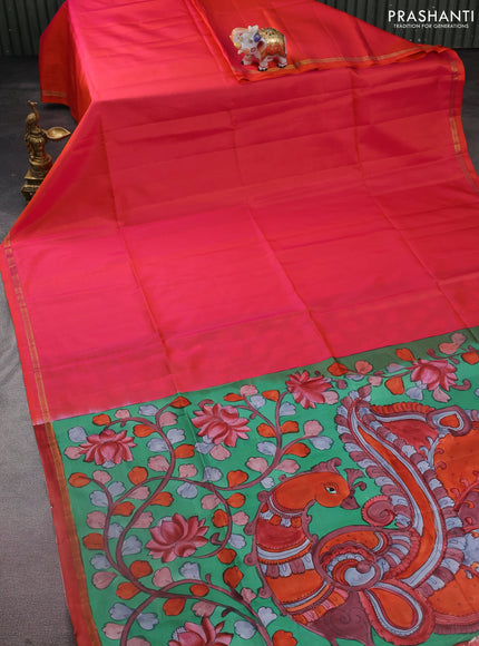 Pure soft silk saree dual shade of pinkish orange and green with plain body and kalamkari hand painted pallu