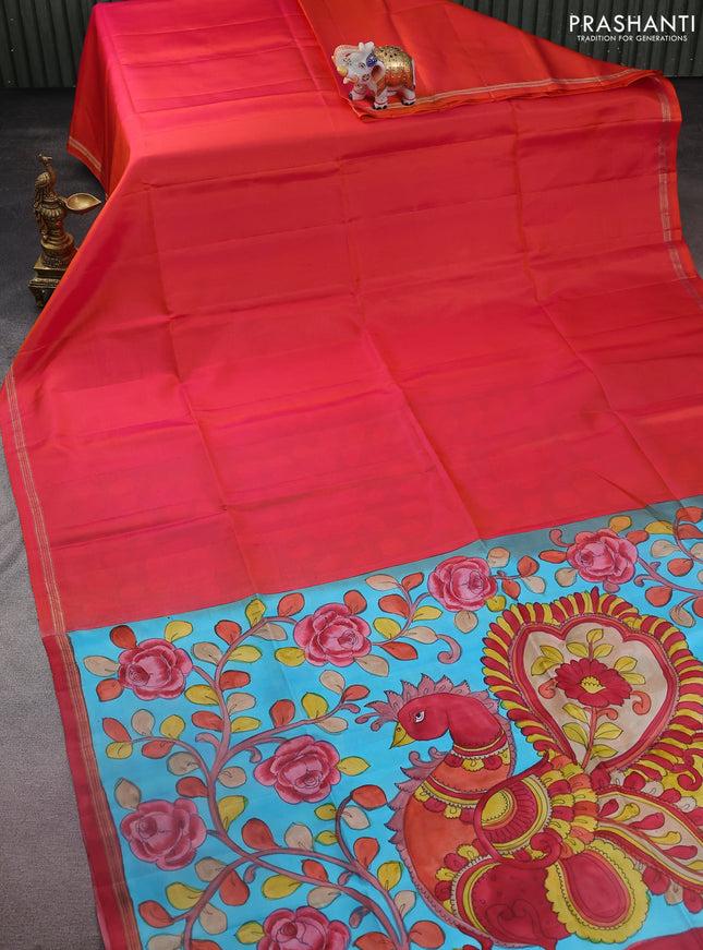 Pure soft silk saree dual shade of pinkish orange and light blue with plain body and kalamkari hand painted pallu