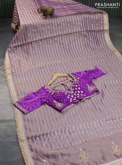 Tissue saree dual shade of violet with allover silver & gold zari weaves and lace work border