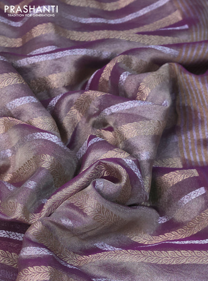 Tissue saree dual shade of violet with allover silver & gold zari weaves and lace work border