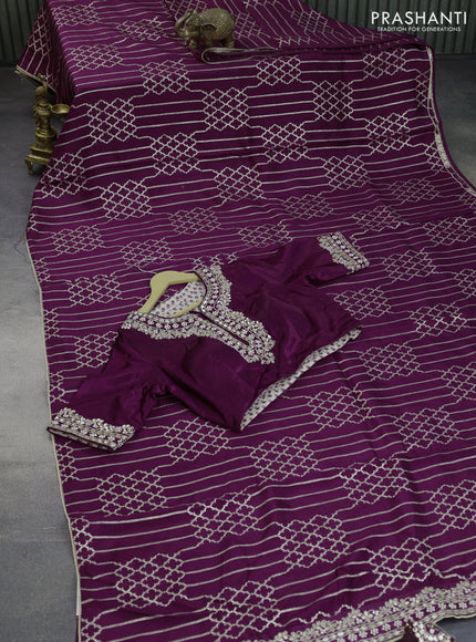 Munga tussar saree purple with allover zari weaves and lace work blue